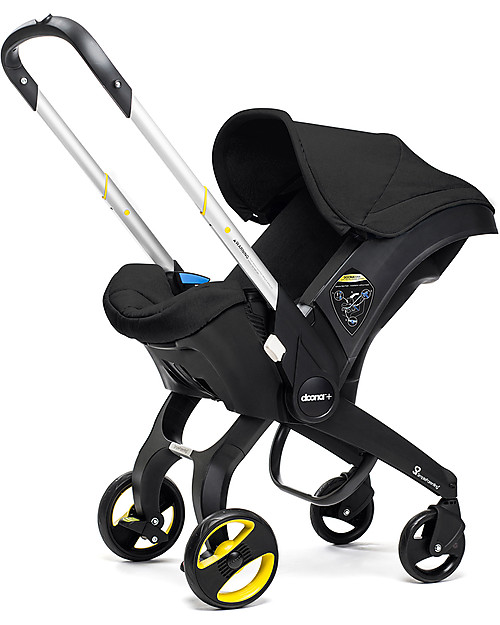 Doona Doona+, Seggiolino Auto con Ruote 2-in-1, Nero - Approvato come passeggino! Seggiolini Auto Gruppo 0+/1