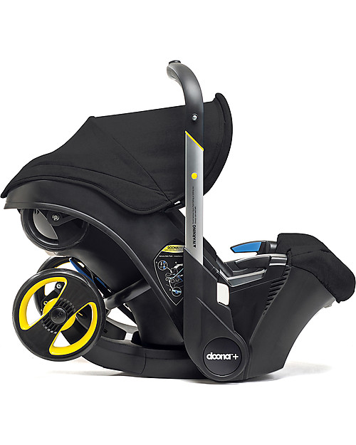 Doona Doona+, Seggiolino Auto con Ruote 2-in-1, Nero - Approvato come passeggino! Seggiolini Auto Gruppo 0+/1