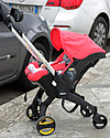 Doona Doona+, Seggiolino Auto con Ruote 2-in-1, Rosso - Approvato come passeggino! Seggiolini Auto Gruppo 0+/1