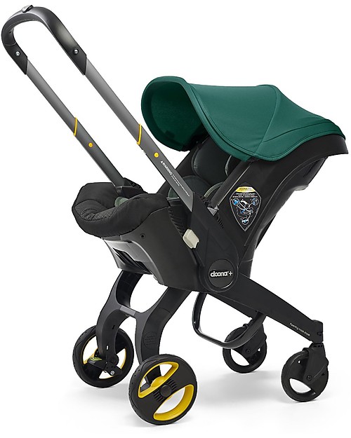 Doona Doona+, Seggiolino Auto Gruppo 0+ con Ruote 2-in-1, Verde Racing - Approvato come passeggino! Seggiolini Auto Gruppo 0+/1