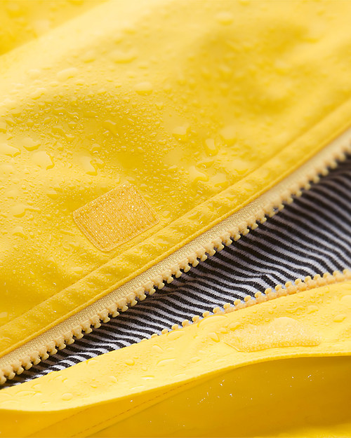 Petit Bateau Giacca a Vento Cerata, Giallo - 6 anni- Il più famoso degli impermeabili! Impermeabili