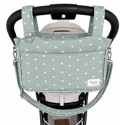 Borsa organizer Family Nation agganciata al manubrio di un passeggino